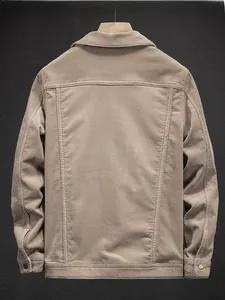 Back view of khaki corduroy jacket with classic yoke lines and button cuffs on hanger