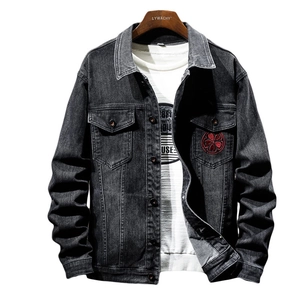 Men's washed black denim jacket with vintage embroidery and dual flap chest pockets