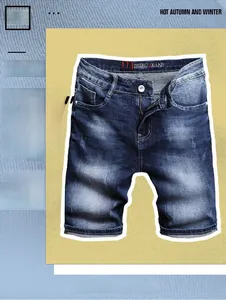Detail of dark blue washed denim shorts with Seiko Jeans branding on the waistband