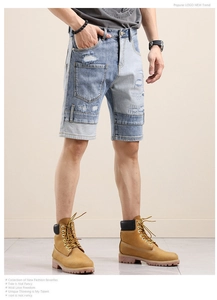 Detail of patchwork denim shorts with distressed effects and dual-tone stitching
