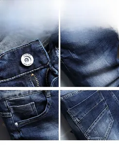 Detail of high-quality denim fabric with metal button, zipper and reinforced double stitching