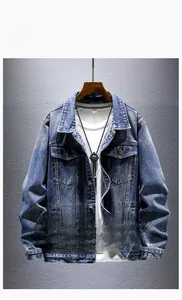 Close-up of classic blue loose denim jacket with metal buttons and cargo pocket details