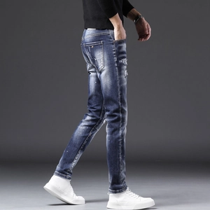 Jeans slim pour hommes avec détails déchirés et éclaboussures de peinture