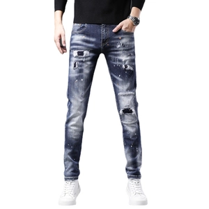 Jean slim droit pour homme avec effet vieilli, taches de peinture et design patchwork