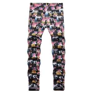 Men's slim fit jeans with colorful graffiti print and streetwear stacked leg design