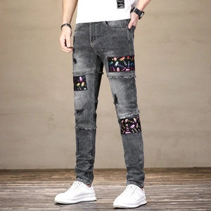 Jean homme gris ajusté avec déchirures et écussons imprimés colorés LSKB style streetwear
