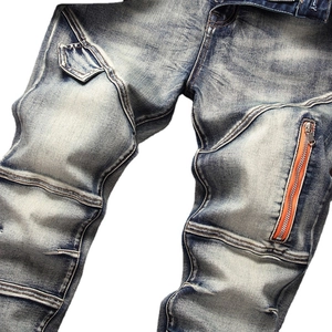 Slim fit men's blue distressed jeans with orange zipper pockets and moto pleat details