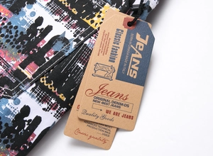 Close-up of urban graffiti print denim jeans with classic leather texture fashion tags