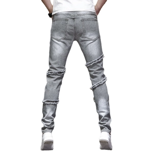 Men's slim fit light gray distressed denim jeans with back leg shredded cutouts