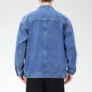 Back view of men's blue denim jacket showing stitching details and adjustable hem