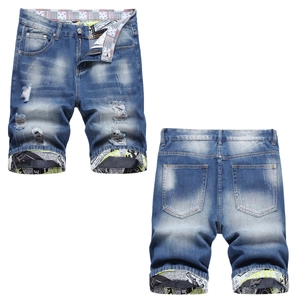 Pantaloncini di Jeans Distressed da Uomo Blu Lavato Strappati Con Fodera Stampa Giornale Pantaloncini Casual Streetwear per Uomo