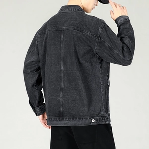 Detail of men's dark grey denim jacket back with vintage wash and Y-seam stitching