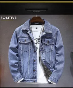 Detail view of winter denim jacket with thick grey fleece lining and classic button closure