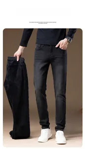 Detail view of winter slim fit black jeans showing thick fleece lining for warmth