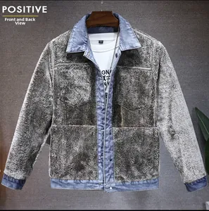 Detail of men's winter denim jacket featuring thick faux fur lining and blue patchwork trim