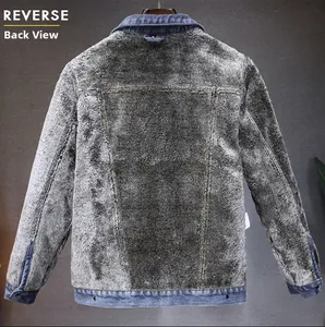 Detailed view of thick grey fleece lining inside a blue denim winter jacket for men