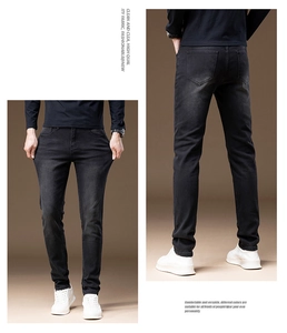 Detail showing the premium stretch and flexible fabric of slim fit dark grey denim jeans