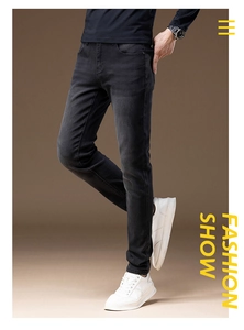 Slim fit dark grey men's stretch jeans showing tapered leg design and quality fabric