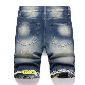 Retro distressed dark blue denim shorts for men with folded cuffs and letter patterns