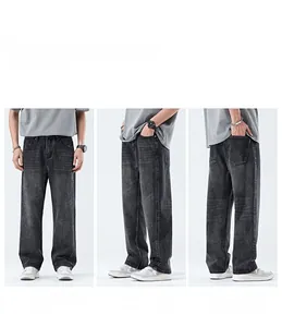 Vista dettagliata su tre lati dei jeans da uomo ampi in denim grigio scuro lavato