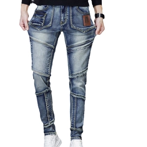 Slim fit men's patchwork distressed denim jeans with vintage wash and multi-pocket design