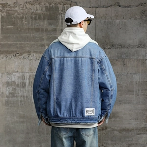 Men's light blue fleece lined denim jacket with sheepskin collar and back logo label