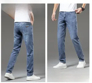 Detailed view of light blue stretch slim fit jeans with classic wash and back pocket detail