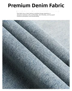 Gros plan sur le tissu denim bleu avec tissage sergé visible et texture durable de qualité