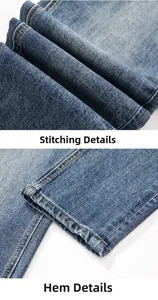 Détail de la double couture orange sur la taille et l'ourlet du jean en denim bleu