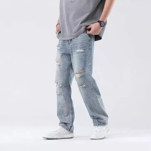 Men's light blue straight-leg jeans with vintage distressed holes and a loose casual fit