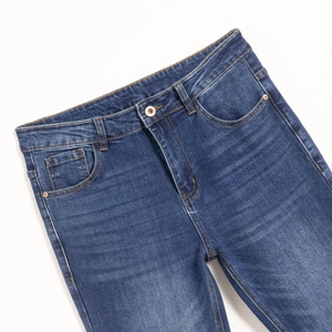 Jean slim extensible bleu classique avec délavage vintage et détails de coutures orange