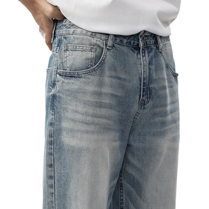 Classic loose fit straight leg jeans for men in light blue wash with vintage whiskering