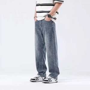 Jean ample homme coupe droite bleu délavé au style rétro streetwear décontracté