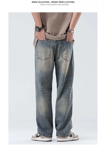 Macro view of vintage blue distressed denim jeans with back pocket and ripped details