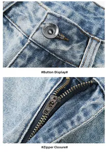 Détail de la fermeture éclair YKK et du bouton métallique gravé sur un jean bleu clair