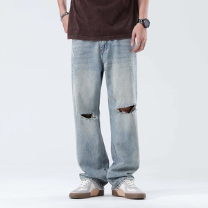 Men's light blue distressed straight-leg denim jeans with ripped knees and loose fit