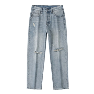 Men's light blue distressed straight leg jeans with vintage ripped knee details