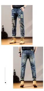 Detail of distressed blue jeans with heavy patchwork, stripes, and red accent stitching