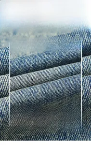 Macro detail of high quality soft denim fabric texture with twill weave in deep blue