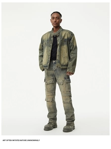 Detail of vintage washed green cargo jeans with multiple pockets in industrial style