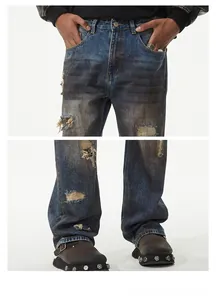 Detailansicht der Vintage-Jeans mit Destroyed-Effekten und Patchwork-Strukturen für Herren