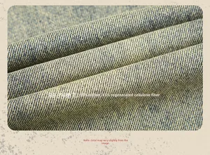 Detail of vintage washed denim fabric texture with 88.3% cotton material composition