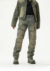 Detail of heavy vintage washed multi-pocket cargo pants and workwear jacket set