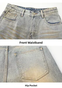 Detail of vintage washed light blue jeans showing front button fly and back pocket seams