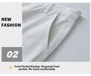 Vista macro dettagliata della tasca anteriore diagonale sui pantaloni bianchi di alta moda