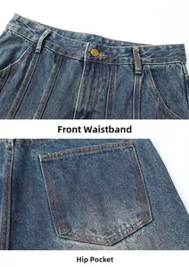 Detailed close-up of dark blue washed denim jeans with vintage buttons and orange stitching