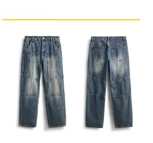 Détail du jean droit vintage américain avec délavage bleu moyen et texture moustaches