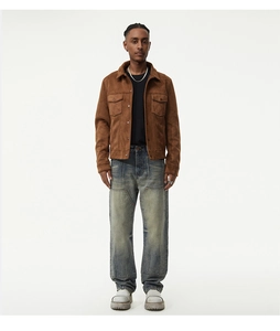 Close-up of brown suede jacket with classic collar and front button chest pockets