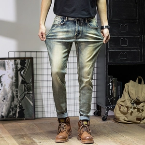 Slim fit men's vintage washed jeans with high elasticity and distressed whiskers effect