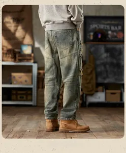 Detail view of American vintage distressed denim jeans with ripped knees and frayed edges